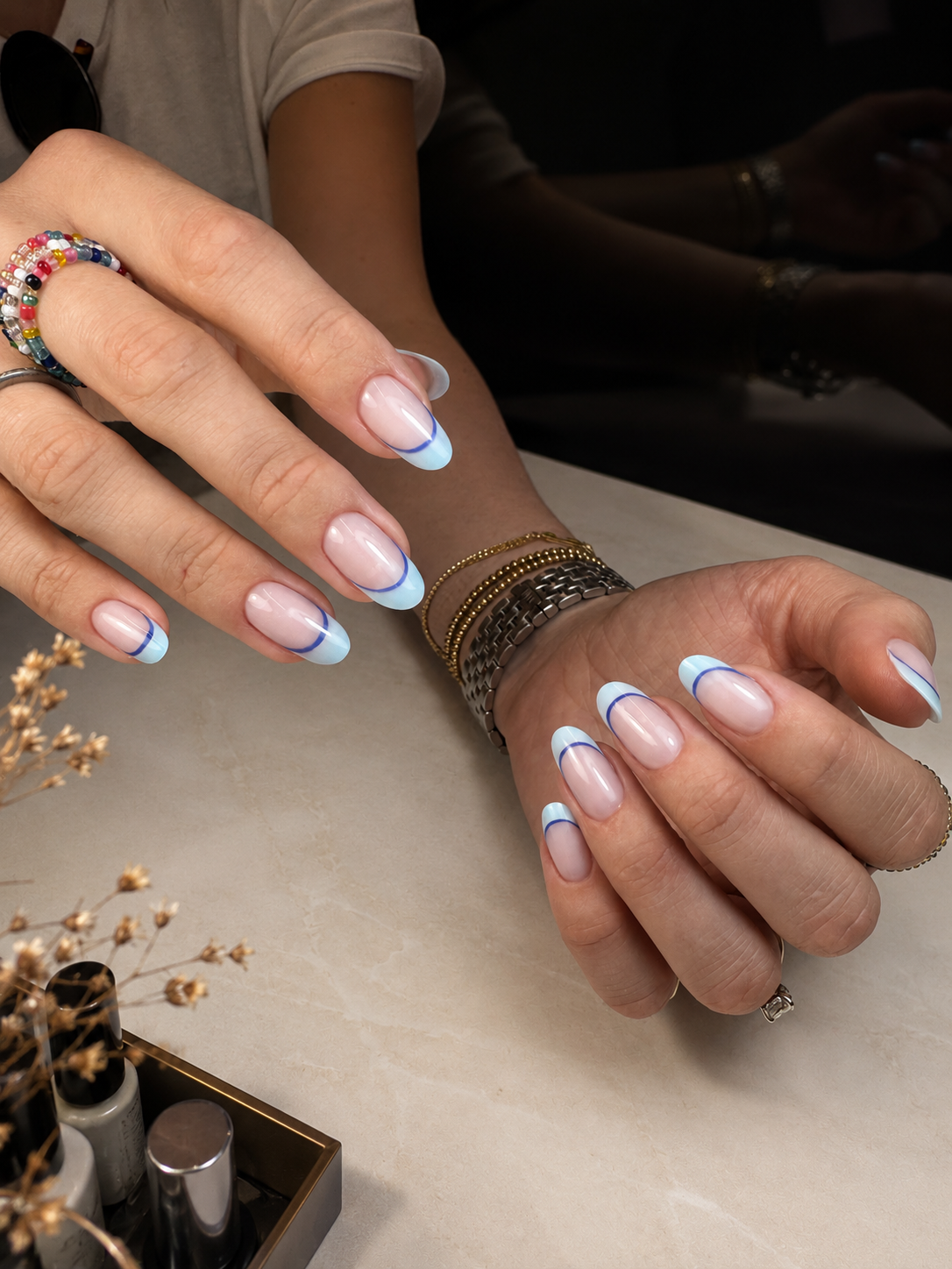 Blue double French manicure on almond nails