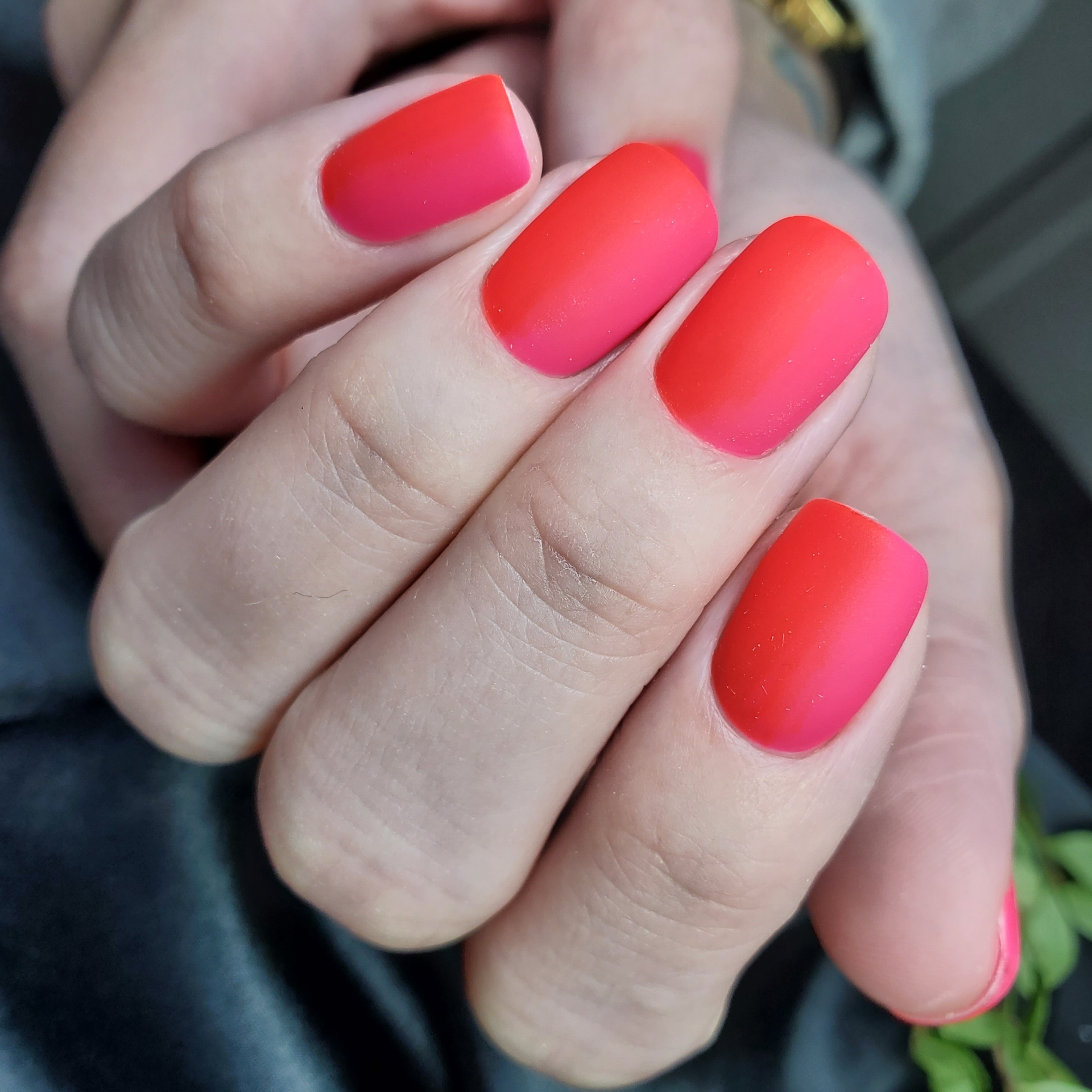 Matte coral red manicure